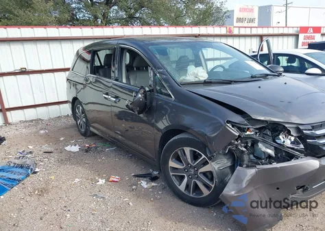 2015 Honda Odyssey Touring/Touring Elite z USA, uszkodzony, nr VIN 5FNRL5H99FB054096